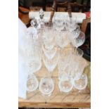Collection of cut glass including Waterford decanter and two Edinburgh crystal decanters wine glass,
