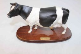 Beswick Friesian Cow on plinth, 30cm across.