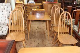 Ercol Windsor drop leaf table and six Quaker back chairs including pair carvers.