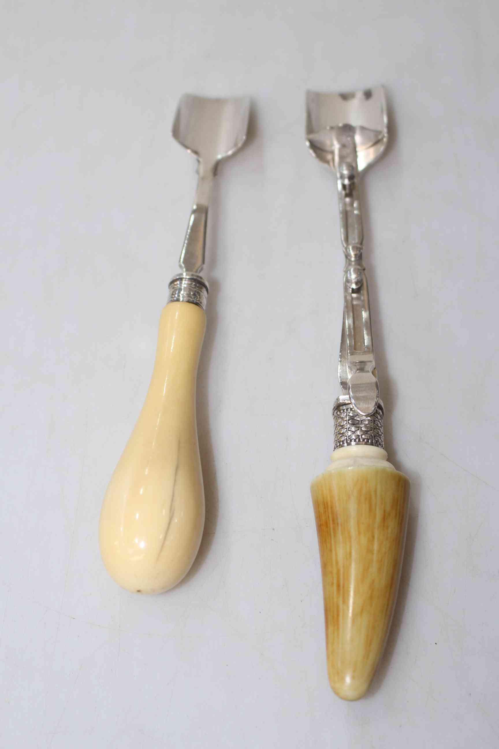 Victorian silver cheese scoop, Sheffield 1860, and EPNS cheese scoop (2).