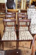 Set of six period mahogany bar back dining chairs on sabre legs.