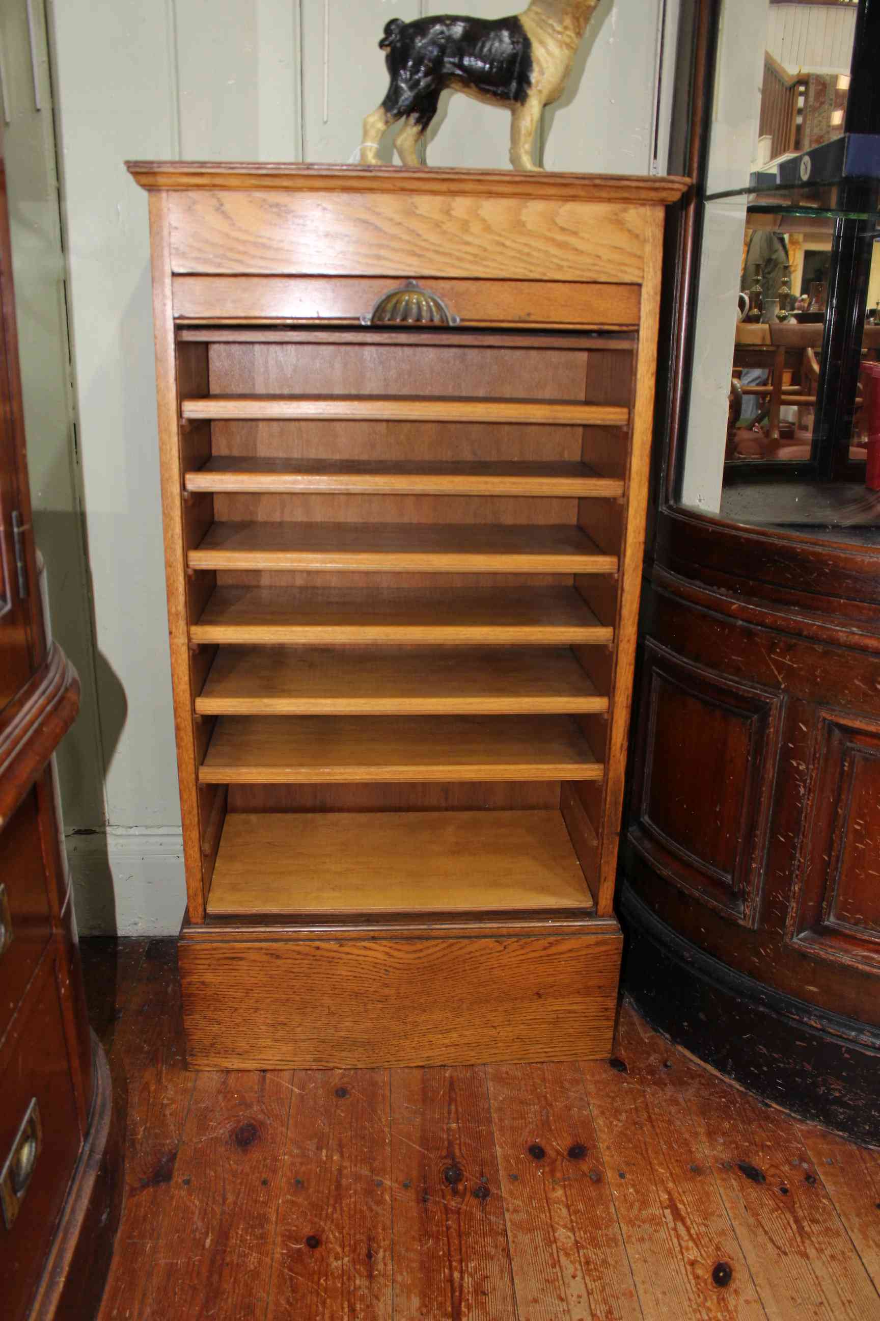 Early 20th Century oak tambour front filing cabinet, 99cm by 53cm by 29.5cm.