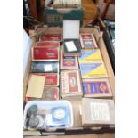 Photograph glass slides, negatives, vintage tins, coins, medallions.