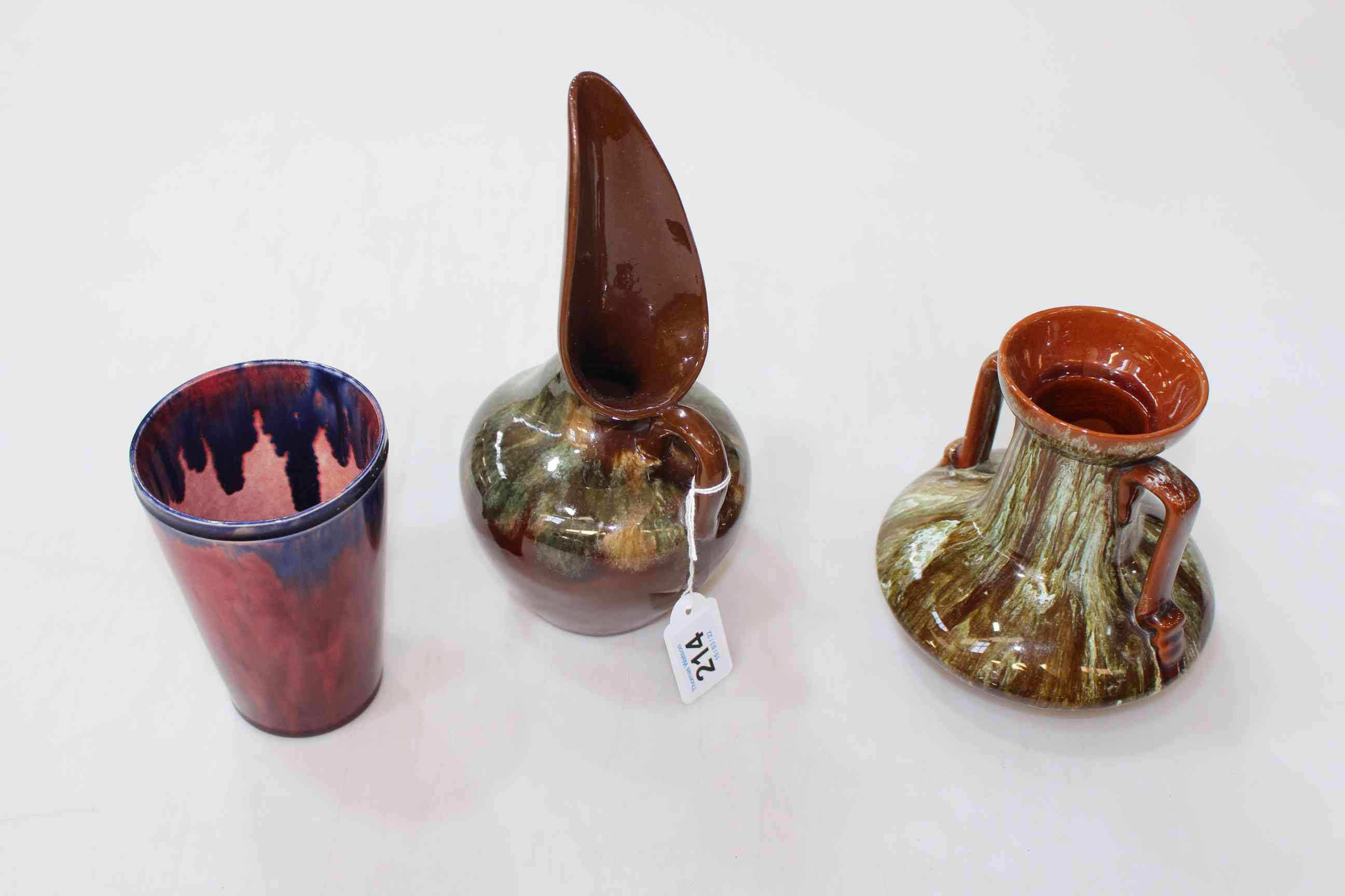 Linthorpe Chr. Dresser beaker 632, two handled vase 957, and Chr. Dresser ewer 346 (3).