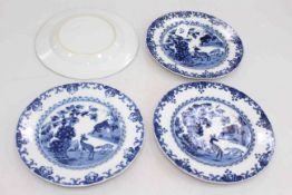 Four Chinese blue and white plates, 22.5cm diameter.