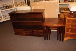 Hardwood three drawer open bookcase and similar nest of table (2).