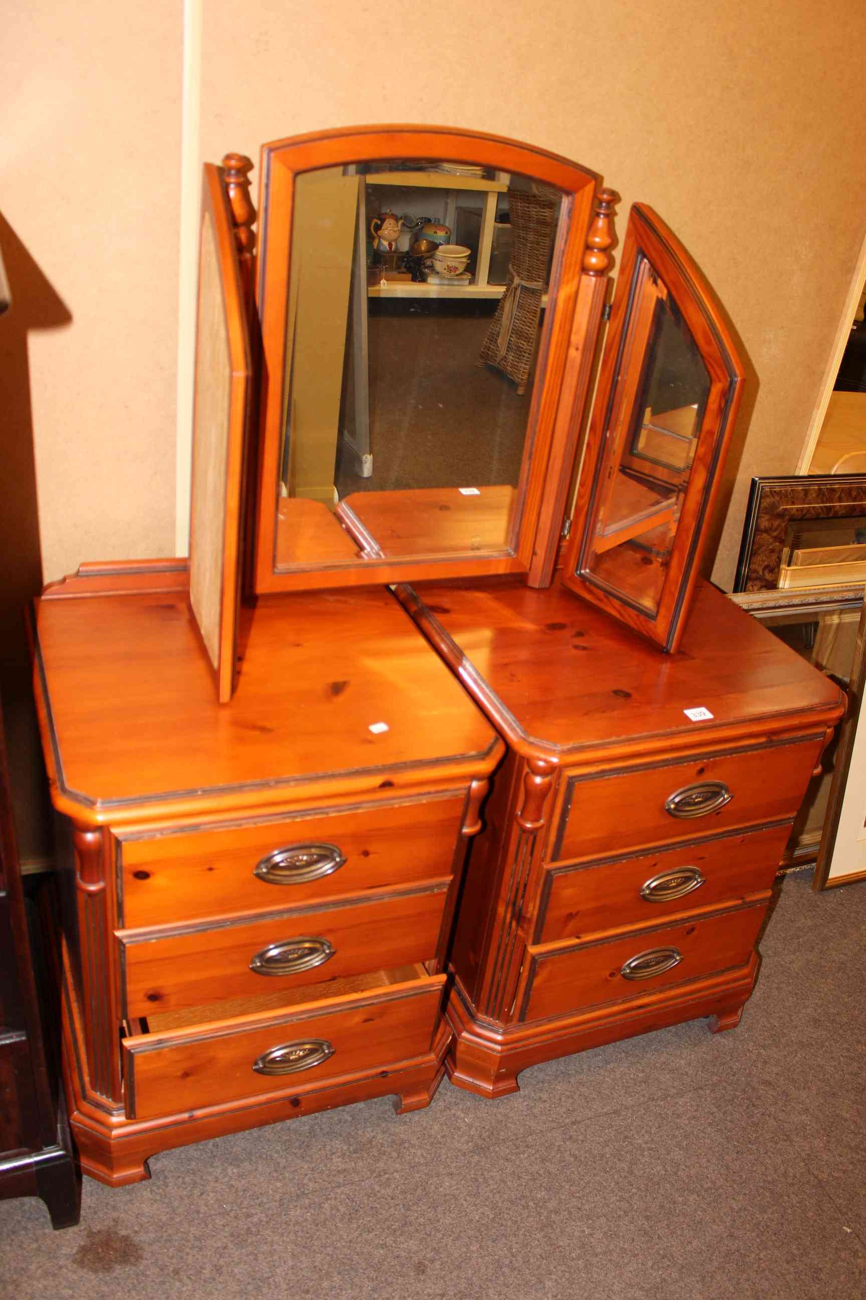 Pair Ducal three drawer pedestals and triple dressing mirror (3).