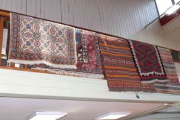 Collection of five various rugs including Indian and Kayam.
