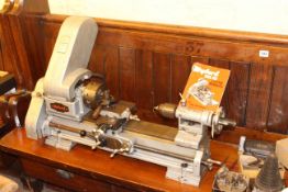 Myford ML10 Lathe with 4 jaw chuck, back gears, tools and manual.