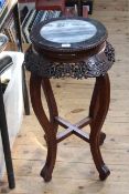 Oriental carved hardwood and marble inset circular jardiniere stand, 73cm by 32.5cm diameter.