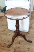 Jaques, London, Victorian mahogany circular tripod games? table, 66cm by 47cm diameter.