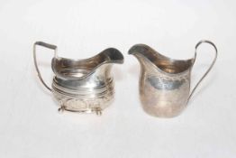 Two George III silver cream jugs and Georgian pistol grip knife and fork.