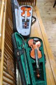 Cased violin and bow and Stentor Junior violin and bow.