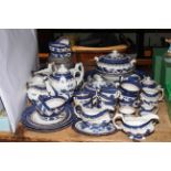 Booths Real Old WIllow blue and white tableware, approximately 65 pieces.