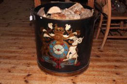 Large Armorial painted two handled log bin and logs, 59cm by 56.5cm diameter.