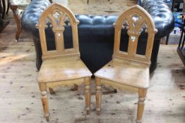 Pair Victorian Gothic style hall chairs.