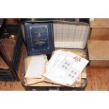 Suitcase of stamps, unused pages,