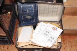 Suitcase of stamps, unused pages,