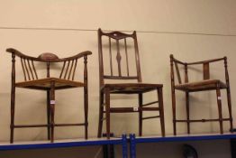 Three Edwardian inlaid mahogany chairs with floral woolwork seats including two corner.