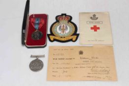 Imperial Service medal awarded to Walter Robinson Bell in Royal Mint box, Bomber Command RAF patch,