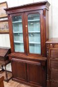 Victorian mahogany cabinet bookcase, 202cm by 108cm by 39cm.