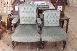 Pair Victorian ladies and gents chairs in green buttoned back fabric.