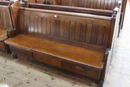 Pair Victorian pitch pine three drawer storage church pews, 160cm long approximately.