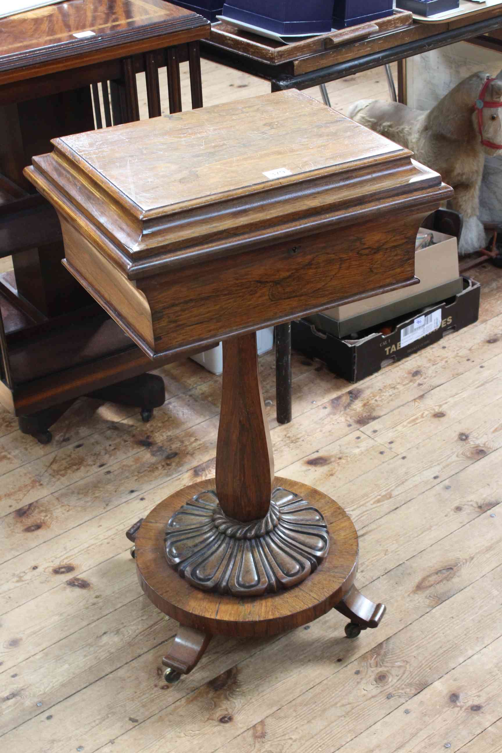 WmIV rosewood work box on turned pedestal to quadriform base, 81cm by 46cm by 39cm.