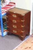 Four drawer Campaign style chest with leather inset top, 62cm by 46cm by 31cm.