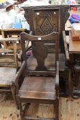 Carved panel back oak elbow chair and jointed oak elbow chair (2).