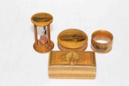 Four pieces of Mauchline ware including Redcar egg timer.