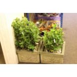 Pair square stone garden planters and box of tools.