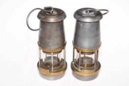 Two Wolf Safety Lamp miners lamps.