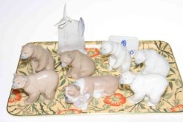Collection of Lladro six bears, bulldog and two advert plaques.