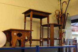 Pottery stick stand and sticks, two oak occasional tables and pair hardwood elephant stools.