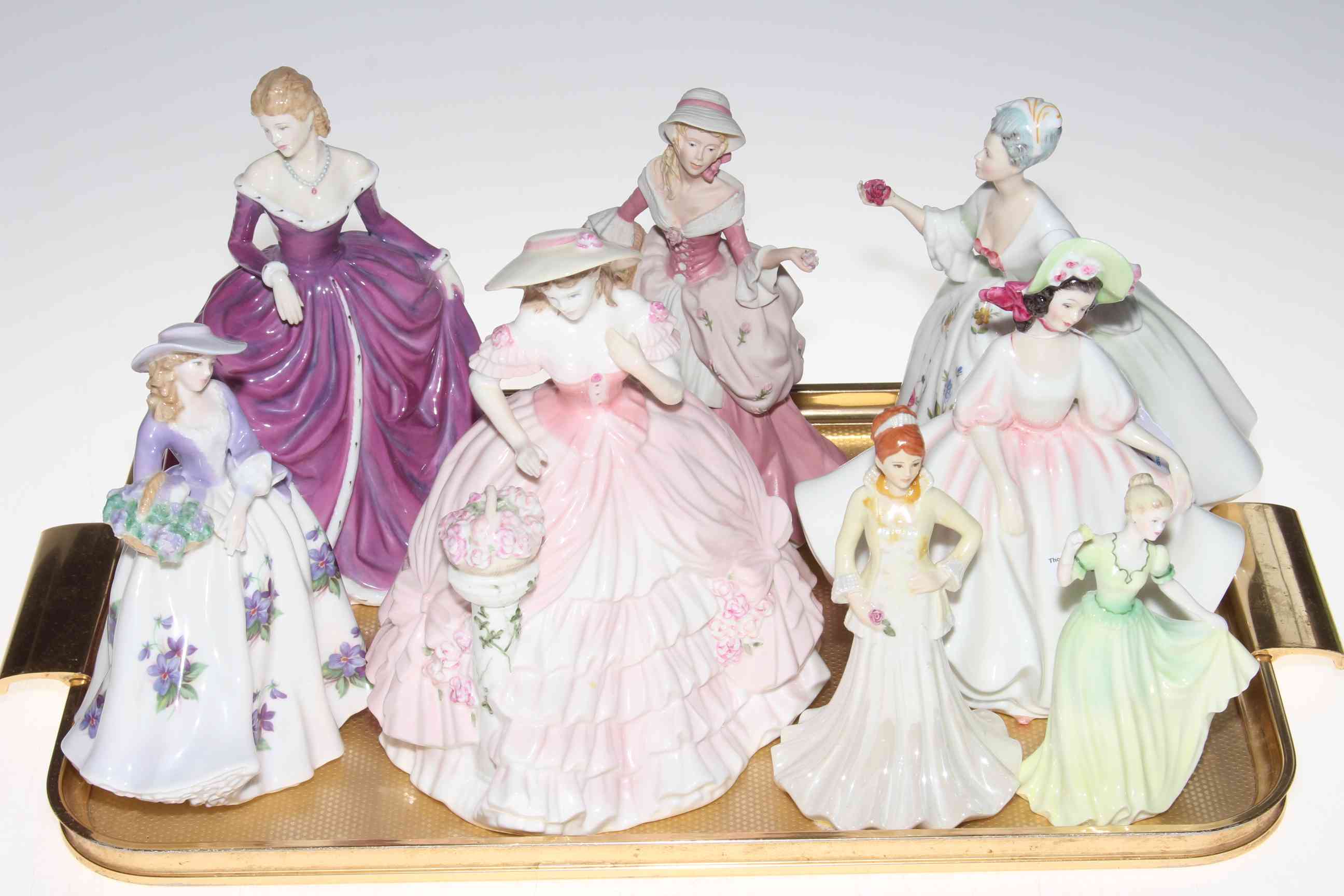 Collection of eight Royal Doulton, Worcester, Coalport and Wedgwood ladies.