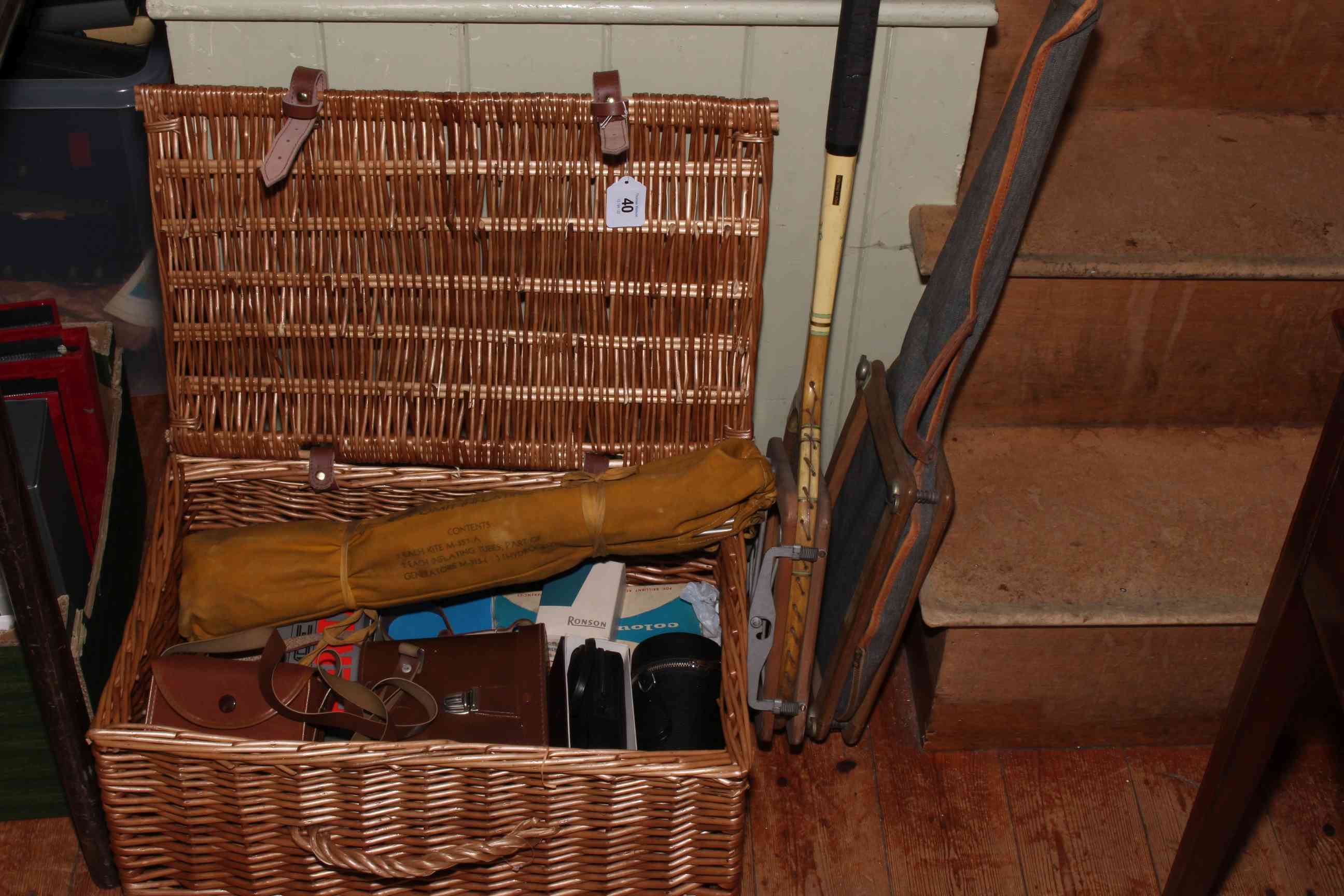 Picnic basket, vintage tennis rackets, binoculars, photographic equipment, etc.