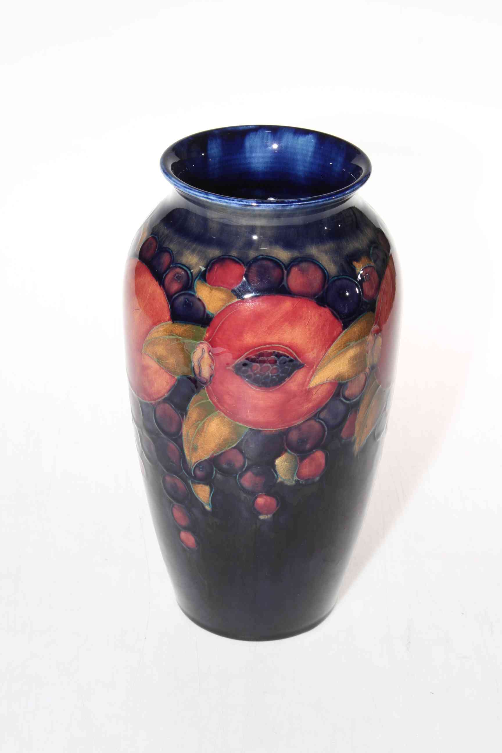 Moorcroft Pomegranate vase, impressed and painted marks, 25cm.