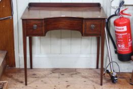 Edwardian mahogany and line inlaid desk having hinged lid and inverted bow front centre on square