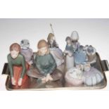Collection of six Lladro figures (one damaged head and one umbrella),