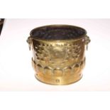 Ornate brass two handled jardiniere, 29cm high.