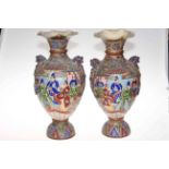 Pair large Oriental pottery vases with profuse figure and patterned decoration, 45cm.