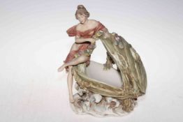 Royal Dux figure of maiden resting on open sea shell, 28cm.