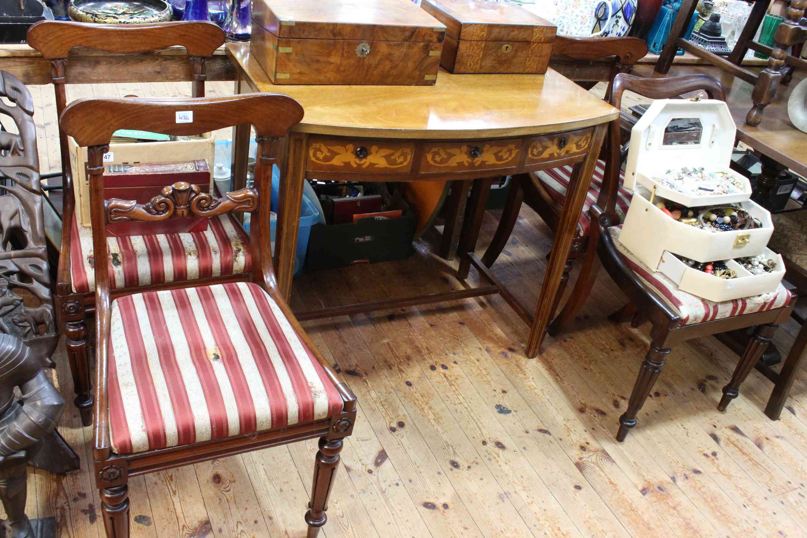 Inlaid mahogany three drawer bow front side table and four Victorian dining chairs (3x1).