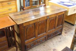 Antique oak quadruple arched panel front mule chest with two base drawers, 78cm by 138cm by 52cm.