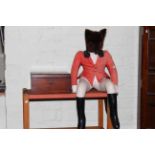 Fox soft toy dressed in hunting costume and a Victorian mahogany writing box.