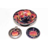 Moorcroft Pomegranate footed bowl (restored) impressed and painted marks, 21cm diameter,