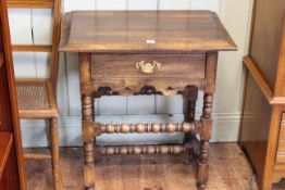 Oak single drawer side table on bobbin legs, 71cm by 69cm by 45cm.