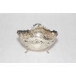 Continental white metal bowl with embossed decoration, 12.5cm across, marks to base.