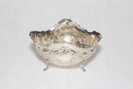 Continental white metal bowl with embossed decoration, 12.5cm across, marks to base.